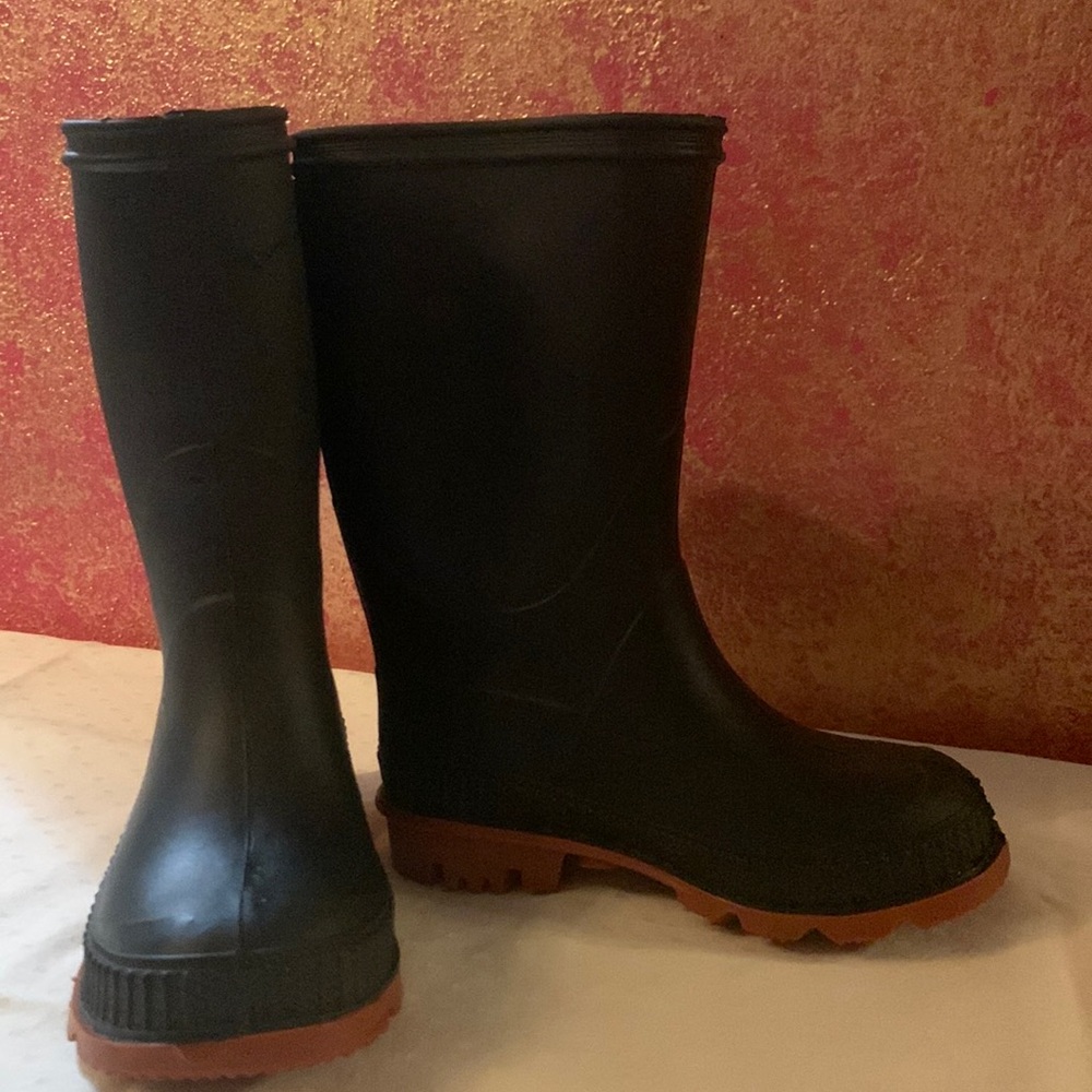 Rubber rain/mud boots. New, never worn.